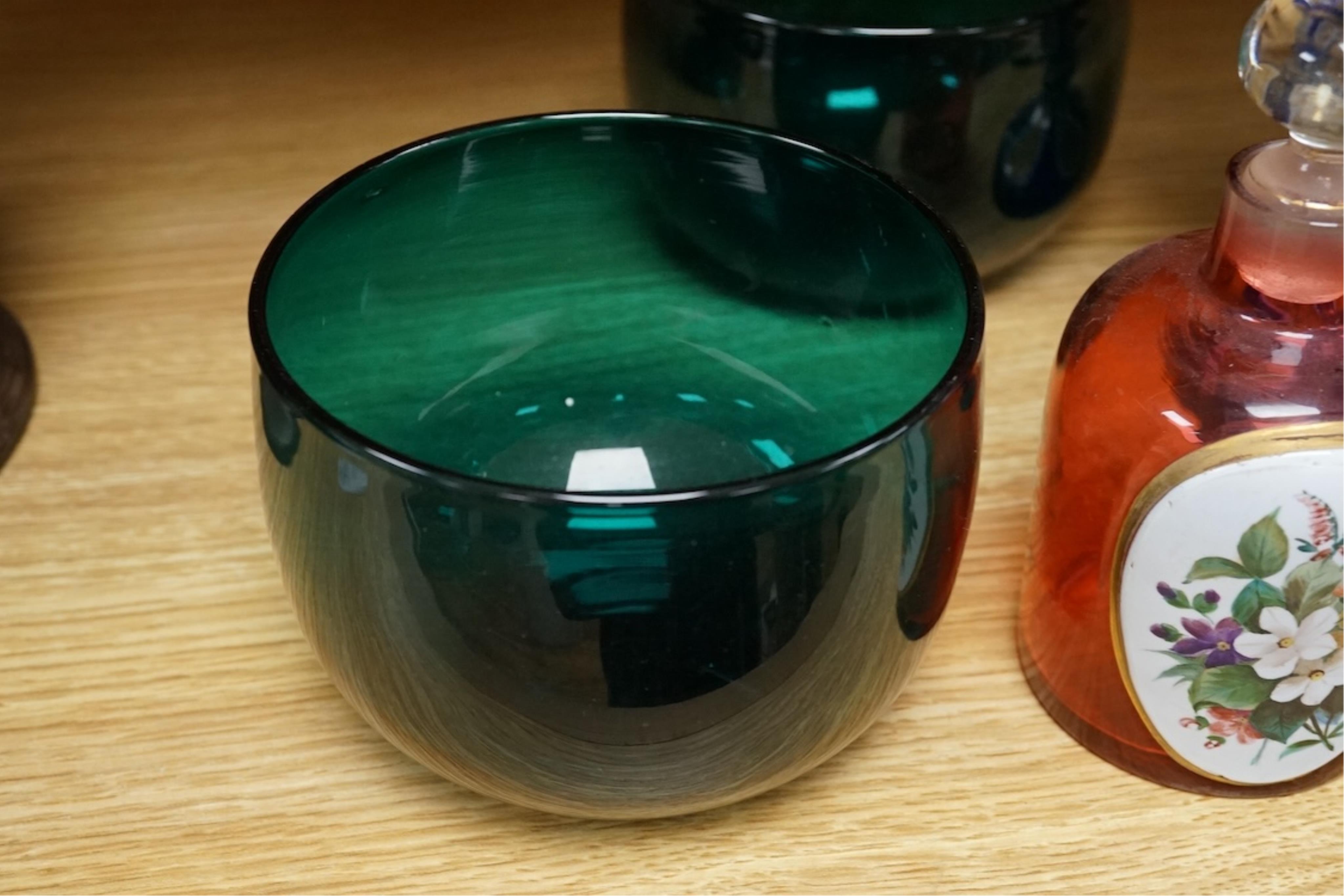 A pair of 19th century green glass fingerbowls, a Bohemian blue overlaid glass vase and a ruby glass scent bottle, largest 20cm high